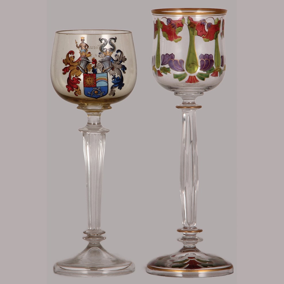 Bohemian wine glasses, two, 7.7" ht. & 8.3" ht.: Bohemian wine glasses, two, 7.7" ht., blown, clear, double-helmet coat-of-arms, inscription dated Halle 1904; with, 8.3" ht., blown, clear, Art Nouveau, transparent enamel floral, wonderful detail, bo