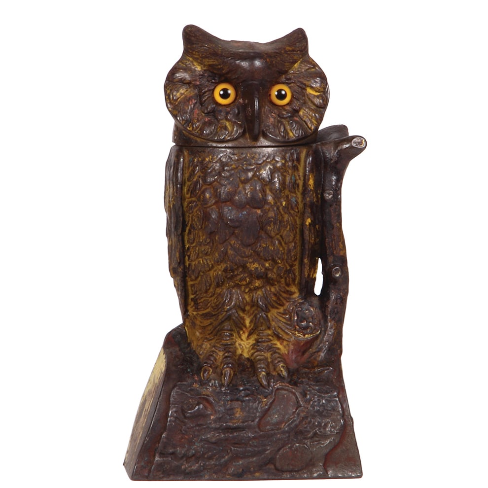 Cast Iron Mechanical Bank, 7.5” ht., Owl.: Cast Iron Mechanical Bank, 7.5” ht., 4.0” wide, 3.0” deep, Owl, made by J. & E. Stevens, Pat. 1880. Refer to the photographs to evaluate the condition, including color wear.