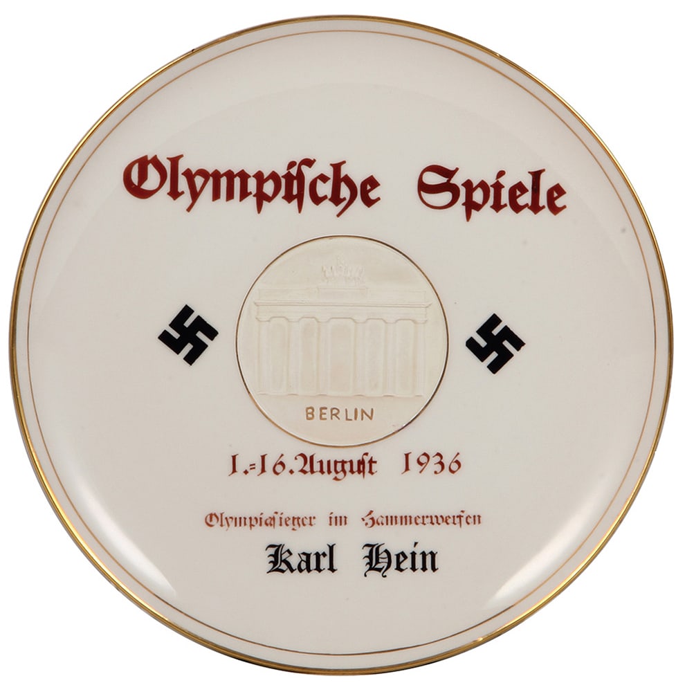 Olympics plaque, 10.5" d., marked K.P.M., Olympische Spiele Berlin, 1936.: Olympics plaque, 10.5" d., porcelain, marked K.P.M., Olympische Spiele Berlin 1.=16. August, 1936, Olympia Sieger im Hammerwerfen Karl Hein, Karl Hein won Gold for Germany in the Hammer Throw, setting