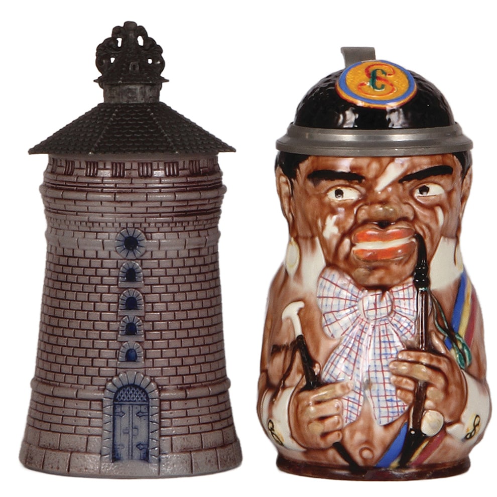 Character steins, two, .5L, Nürnberg Tower & Black Student.: Character steins, two, .5L, stoneware, marked T.W., Nürnberg Tower, mint; with, .5L, pottery, marked Geschützt, Black Fraternity Student, glazed, glaze chips touched up, owner I.D. on pewter