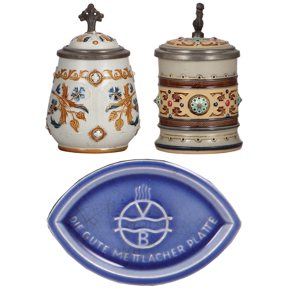 Mettlach items, three, stein, .25L, 1802, .3L, 1084, & advertising tray.: Mettlach items, three, stein, .25L, 1802, mosaic, inlaid lid; with, stein, .3L, 1084, mosaic, inlaid lid; with Mettlach advertising tray, 5.1" x 3.4", Die Gute Mettlacher Platte, rare, all mint.