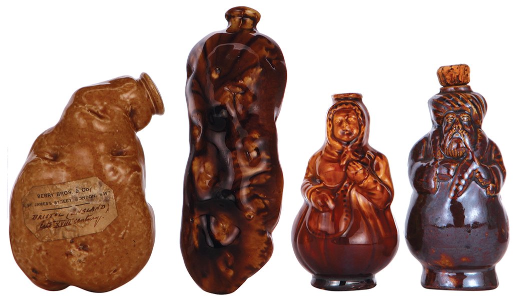 Four stoneware flasks, probably Rockingham (1 of 1)