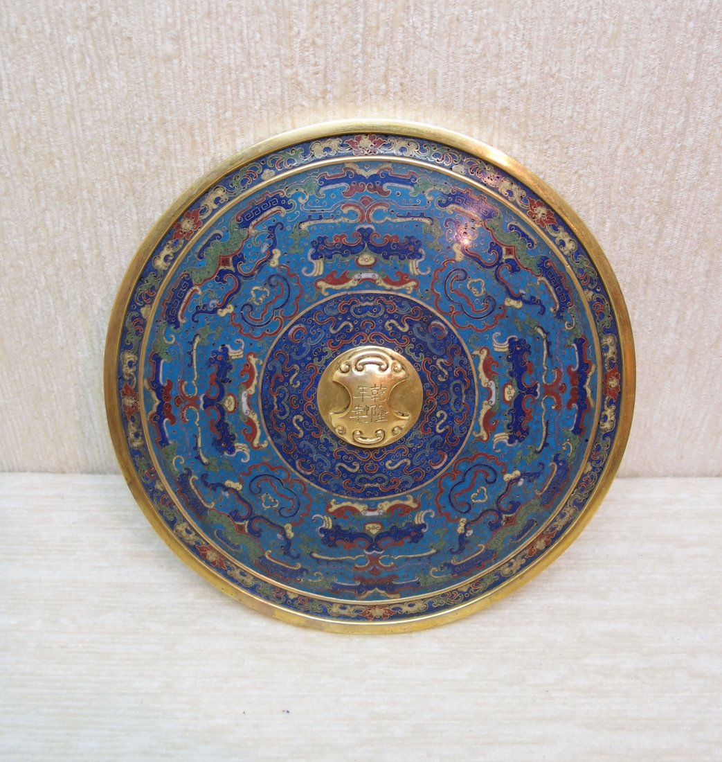 A Cloisonne Enamel Mirror, Qianlong Mark: A beautiful cloisonne enamel mirror with Qianlong mark, measures 18cm diameter.