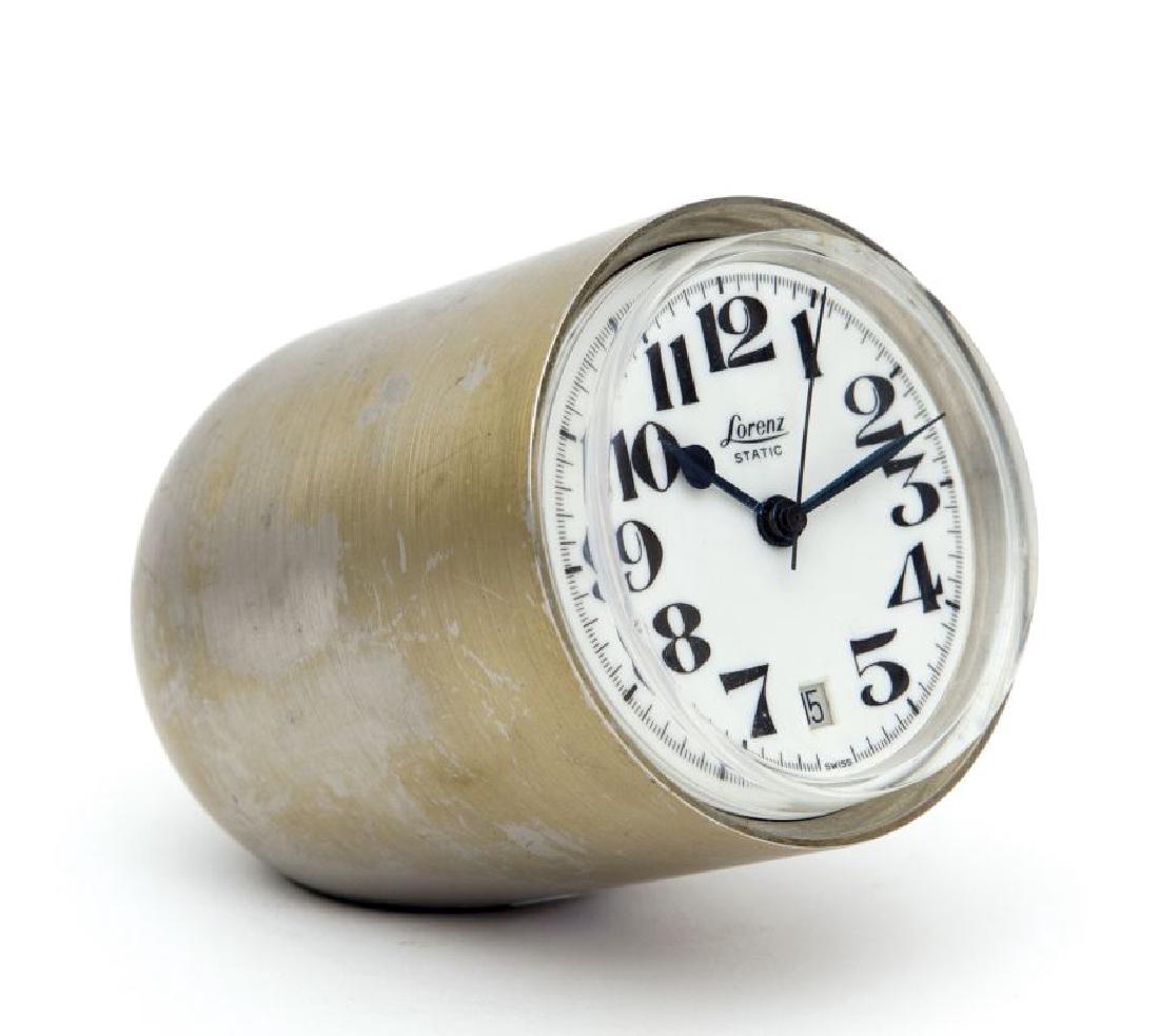 RICHARD SAPPER Un orologio da tavolo "Static": RICHARD SAPPER Un orologio da tavolo "Static" per LORENZ, premio Compasso d"oro 1960. Cassa di ottone ossidato satinato. Lunghezza cm 9,8, diametro cm 6,5. Letteratura: Domus 377 (aprile 1961), p. 48
