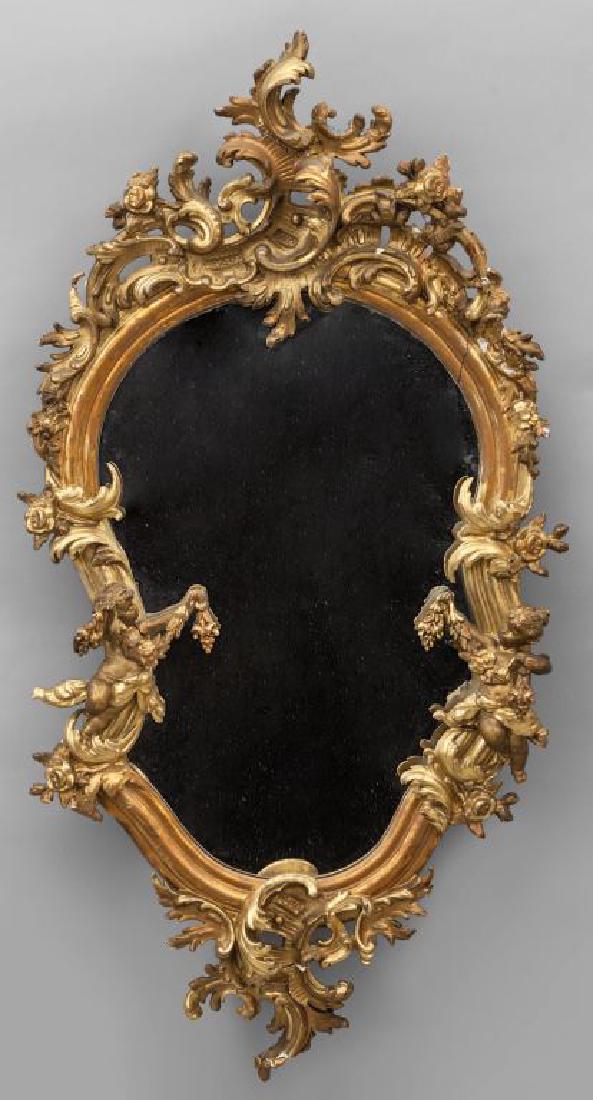 Specchiera in gesso dorato decorata con putti: Specchiera in gesso dorato decorata con putti inizi sec.XX (difetti) cm. 70x130