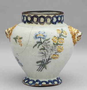 Vaso in ceramica policroma, decorazione a fiori: Vaso in ceramica policroma, decorazione a fiori su fondo bianco, mascheroni ai lati, Torino sec.XVIII h.cm.25, difetti, restauri e mancanze