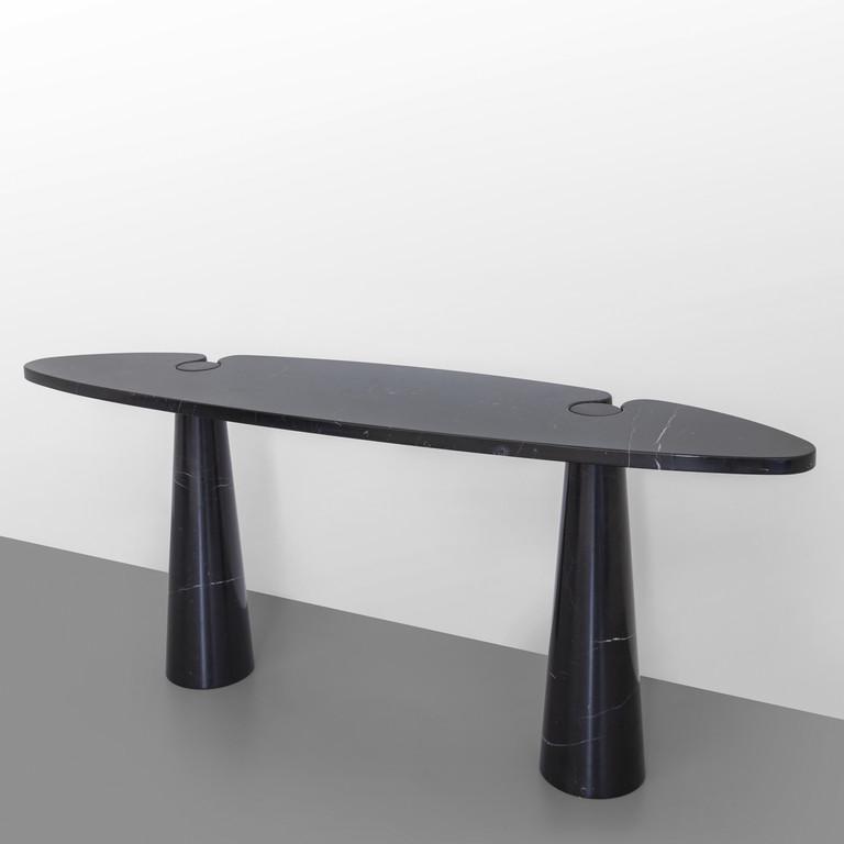 ANGELO MANGIAROTTI Una console della serie: ANGELO MANGIAROTTI Una console della serie 'Eros' per SKIPPER, 1971. Marmo nero Marquina. Cm 72 (h) x 180 x 45. A console from the 'Eros' series manufactured by SKIPPER, 1971. Marquina marble. 28.3 (h