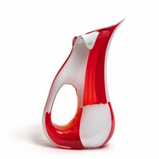 ANZOLO FUGA, A.Ve.M., circa 1965. Un vaso: ANZOLO FUGA, A.Ve.M., circa 1965. Un vaso forato a finestre lattimo e rosso composto da canne accostate. Altezza cm. 35 A vase with a perforated hole made of juxtaposed red and white glass canes. H. 3