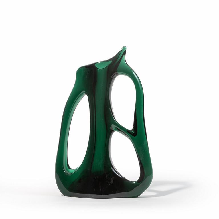 GIORGIO FERRO, A.Ve.M., circa 1955. Un vaso: GIORGIO FERRO, A.Ve.M., circa 1955. Un vaso "ansa volante" in vetro verde trasparente. Altezza cm. 34 An 'ansa volante' (flying handle) vase in transparent green glass H. 34 cm.
