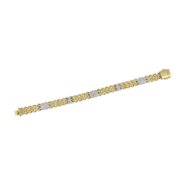 Chimento, bracciale in oro giallo e bianco con: Chimento, bracciale in oro giallo e bianco con particolare maglia a grani di riso, diamanti taglio brillante a pave' sui nodi centrali per ct 1,30 ca. Lunghezza 19 cm. Peso g. 27,3