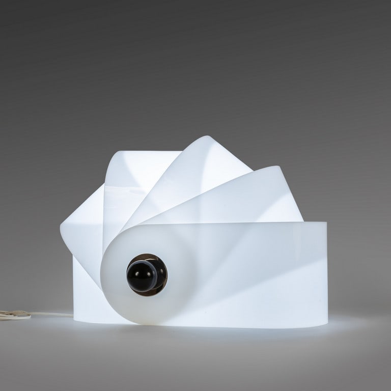 SUPERSTUDIO, POLTRONOVA, 1968. Una lampada da: SUPERSTUDIO, POLTRONOVA, 1968. Una lampada da tavolo 'Gherpe'. Perspex, acciaio cromato. Cm 34 (h) x 53 x 31. A 'Gherpe' table lamp. Perspex, chromed steel. 13.4 (h) x 20.8 x 12.2 inches. Letteratura: