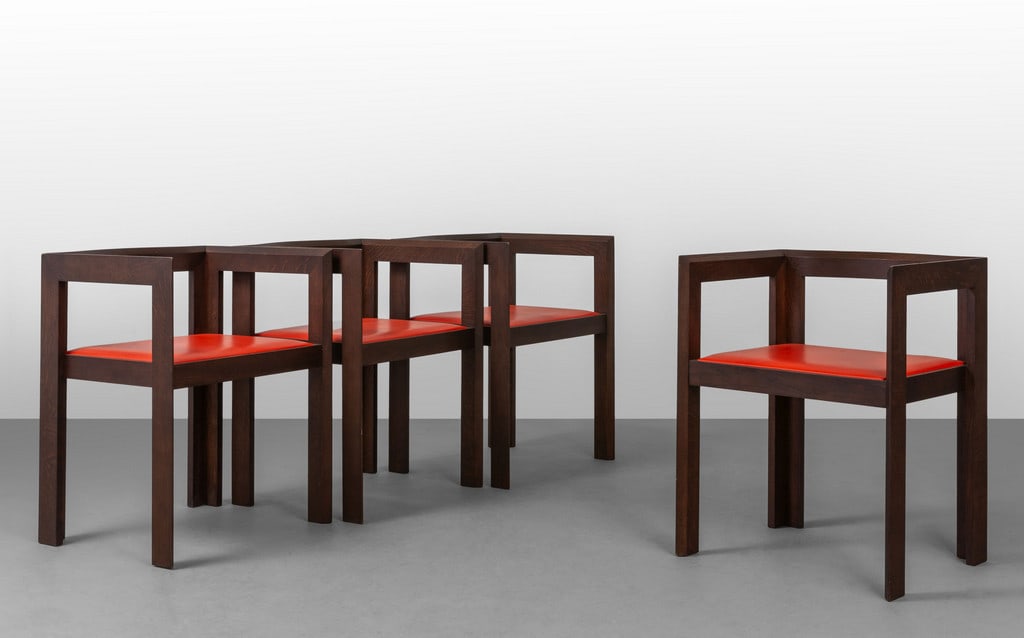 QUATTRO POLTRONCINE, anni '60. Legno di: QUATTRO POLTRONCINE, anni '60. Legno di frassino tinto all'anilina, sedili imbottiti rivestiti in vinilpelle. Altezza cm 67, larghezza 53, profondità 60.
