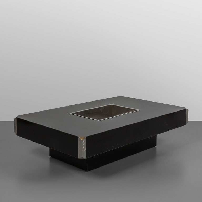 WILLY RIZZO, anni '70. Un: WILLY RIZZO, anni '70. Un tavolino. Truciolare rivestito in laminato, acciaio inox. Cm 33 (h) x 129 x 80. A coffee table. Laminated chipboard, stainless steel. 13 (h) x 50.7 x 31.5 inches.