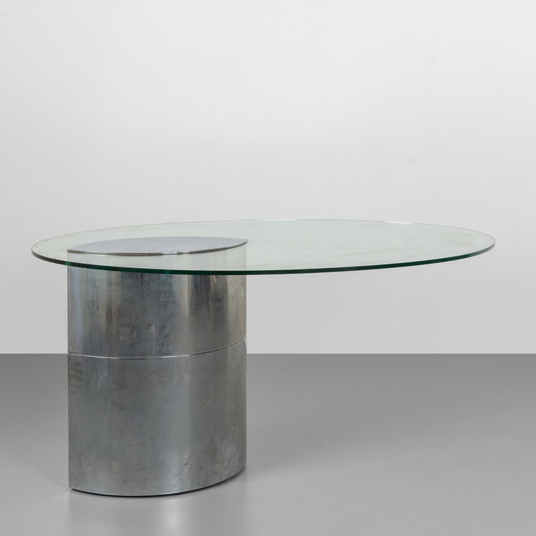 CINI BOERI, GAVINA-KNOLL, 1971. Un tavolo: CINI BOERI, GAVINA-KNOLL, 1971. Un tavolo 'Lunario'. Acciaio cromato, vetro temperato. Cm 70 (h) x 150 x 110. A 'Lunario' table. Chrome-plated steel, tempered crystal top. 27.5 (h) x 59.1 x 43.3 inche