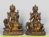 Coppia di grandi divinità in bronzo parzialmente