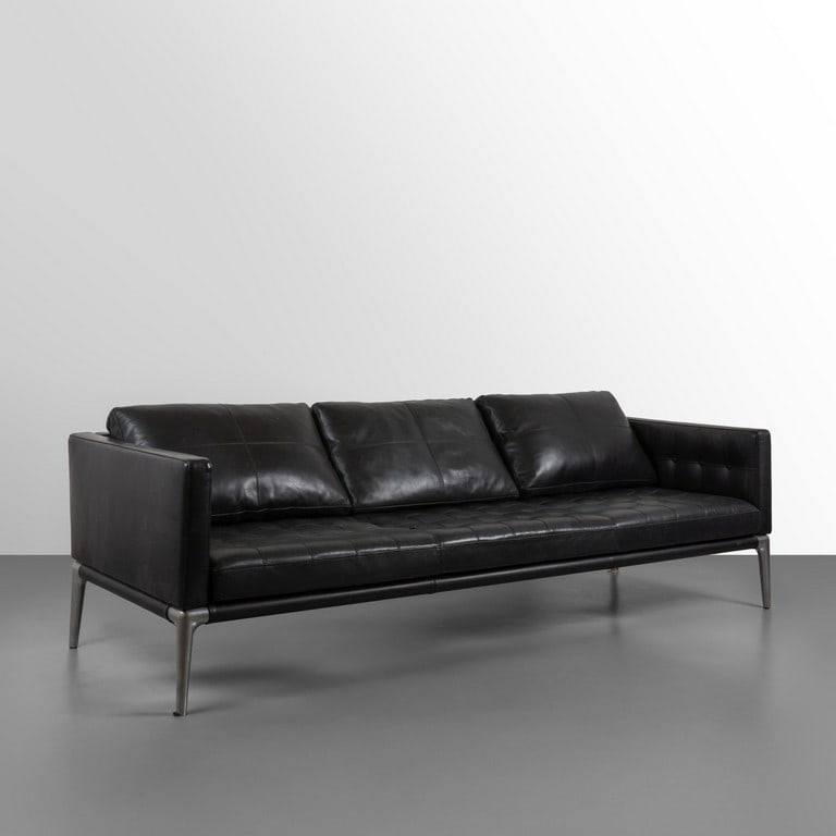 PHILIPPE STARCK, CASSINA, 2007. Un divano: PHILIPPE STARCK, CASSINA, 2007. Un divano della serie 'Privè'. Struttura in alluminio, imbottiture rivestite in pelle. Cm 65 (h) x 242 (l) x 95 (p). A sofa from the 'Privè' series. Aluminum structur