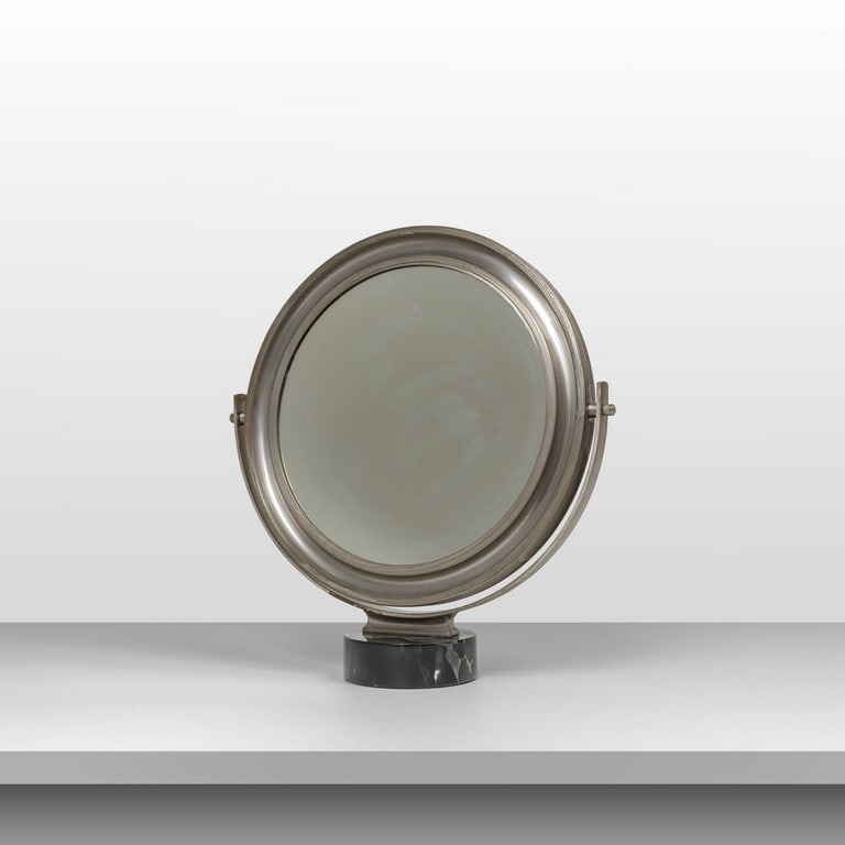 SERGIO MAZZA, ARTEMIDE, anni '70. Uno: SERGIO MAZZA, ARTEMIDE, anni '70. Uno specchio 'Narcisso tavolo'. Marmo, ottone nichelato opaco, cristallo argentato. Cm 51 (h) x 42 (diam.). Letteratura: catalogo Artemide 1973, p. 181.