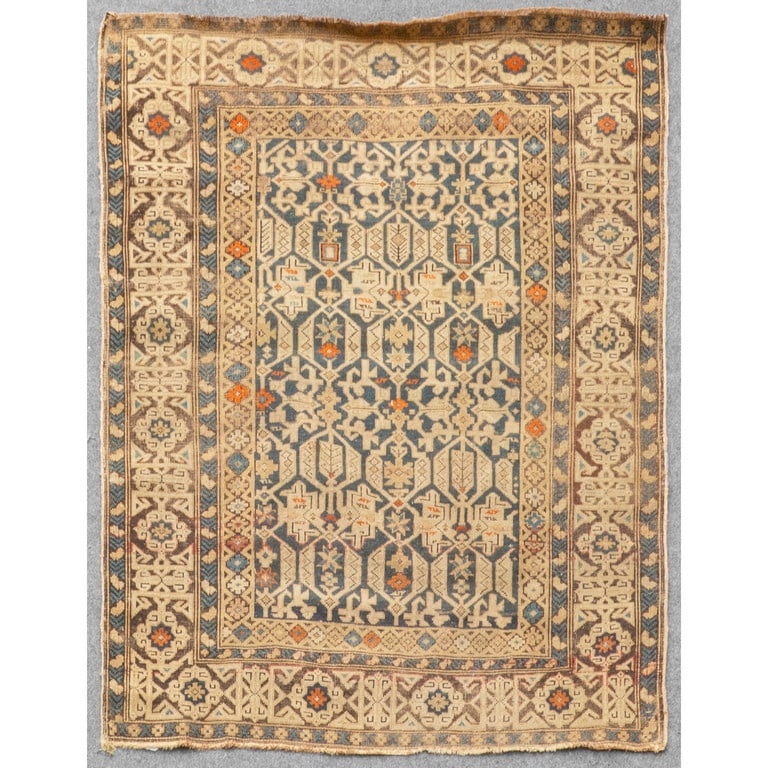 Tappeto caucasico a fondo blu con motivi bruni, (1 of 2)