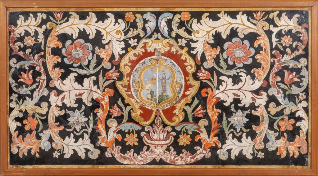 Paliotto in scagliola policroma decorato con: Paliotto in scagliola policroma decorato con volute e disegni floreali, al centro stemma nobiliare con animali e personaggi, Toscana sec.XVIII cm. 150x80, restauri