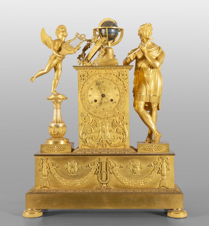Grande orologio Impero in bronzo dorato: Grande orologio Impero in bronzo dorato raffigurante allegoria della musica, Francia inizi sec.XIX h.cm.65