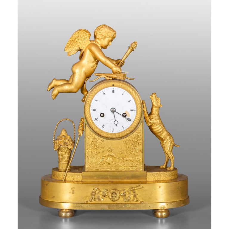 Orologio Impero "a la plu belle" in bronzo: Orologio Impero "a la plu belle" in bronzo dorato, Francia sec.XIX h.cm.33