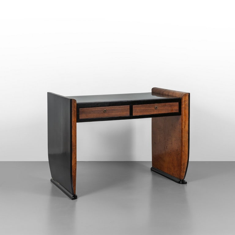 UNA SCRIVANIA, anni '30. Legno ebanizzato, (1 of 2)