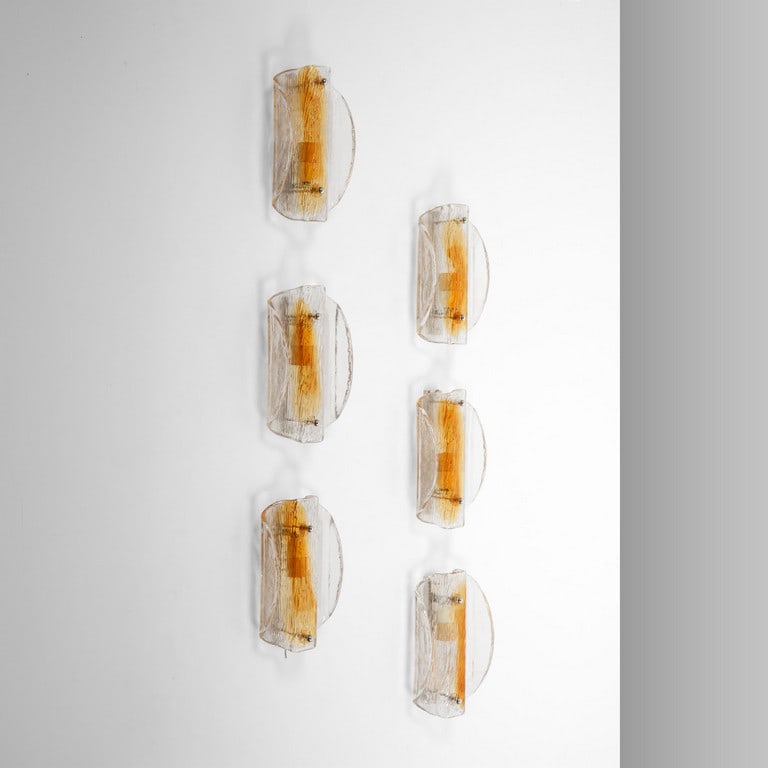 MURANO, anni '70. Sei lampade da: MURANO, anni '70. Sei lampade da parete. Vetro in piastra, strutture in ottone nichelato. Cm 20 (h) x 11 (l) x 6 (p).