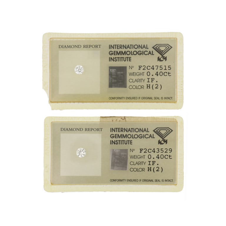 Lotto composto da due diamanti naturali chiusi in: Lotto composto da due diamanti naturali chiusi in blister di forma rotonda taglio a brillante, accompagnati da report gemmologico IGI anversa, attestante le seguenti caratteristiche: 1) Peso 0,40 ct C