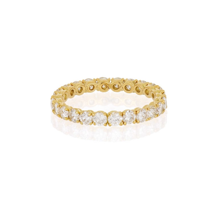 CARTIER - Fedina in oro giallo modello: CARTIER - Fedina in oro giallo modello "Eternity", 25 diamanti taglio brillante si rincorrono senza soluzione di continuita' al dito, ct. 2,50 ca. Misura n. 16, punzoni, numeri e firma della manifattu