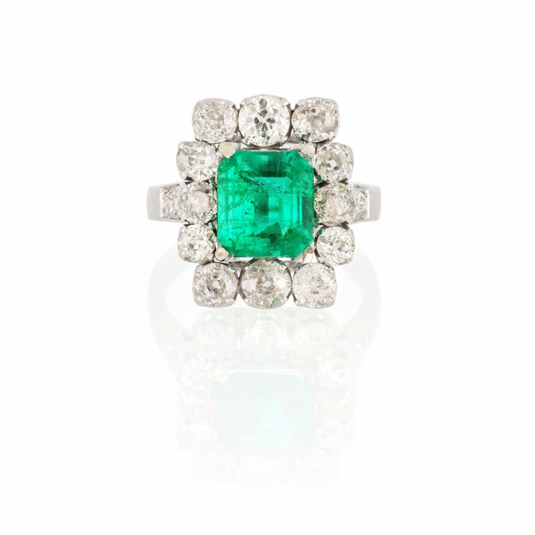 Anello in oro bianco a "Margherita", uno smeraldo (1 of 2)