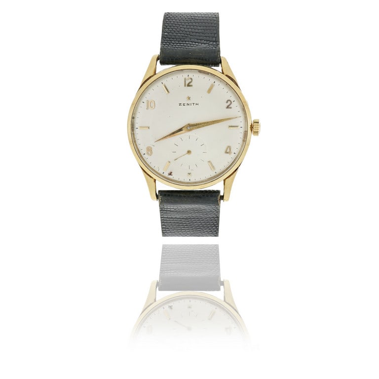 ZENITH - Orologio da uomo in oro giallo modello: ZENITH - Orologio da uomo in oro giallo modello stellina, senza fibbia originale, quadrante argento, indici a cuneo e numeri arabi, movimento meccanico a carica manuale, piccoli secondi a ore 6. Diame
