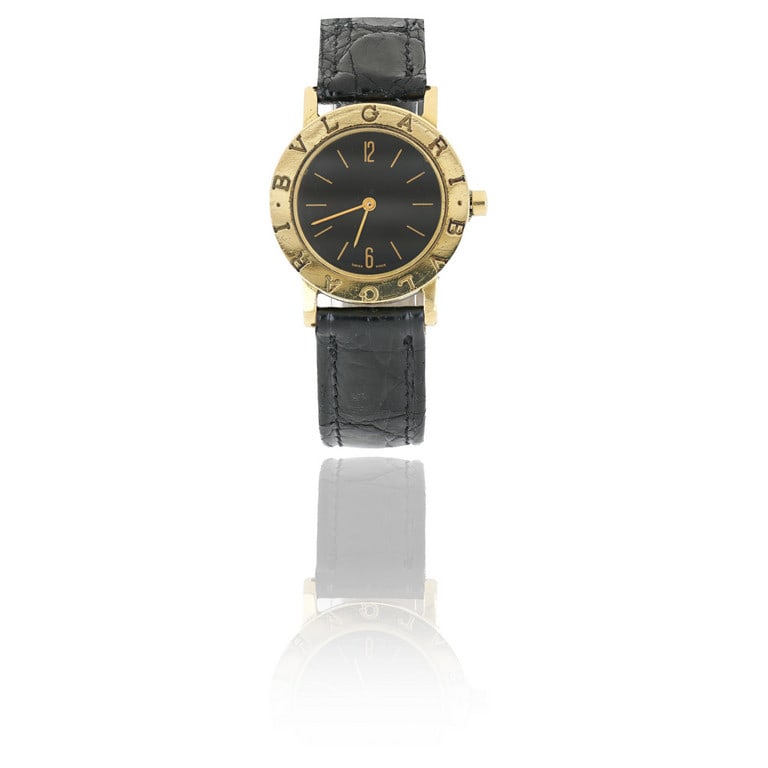 BULGARI Orologio da polso in oro giallo classic: BULGARI Orologio da polso in oro giallo classic Referenza BB26 GL. Movimento elettromeccanico al quarzo, quadrante nero, indici e sfere a bastone. fibbia originale, Revisionato e funzionante.