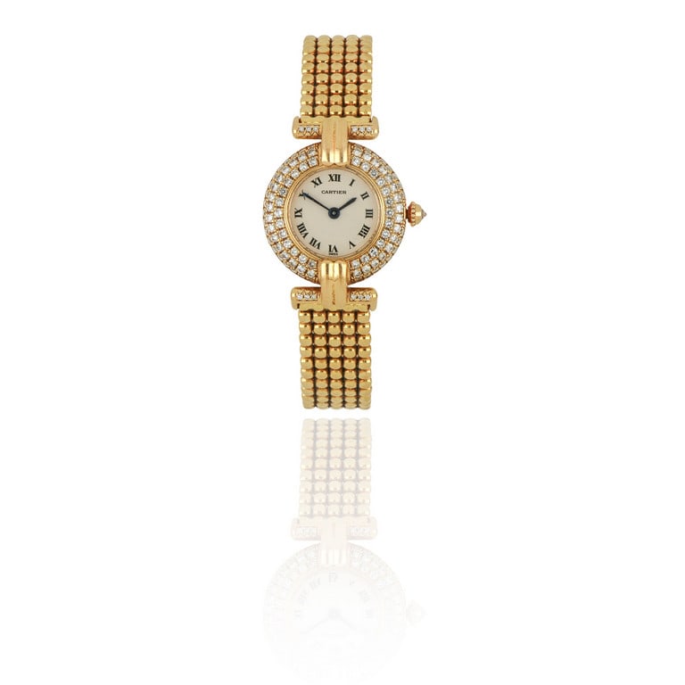 CARTIER, orologio gioiello, in oro giallo con: CARTIER, orologio gioiello, in oro giallo con bracciale integrato, modello Colisèe, la carrure interamente tempestata di diamanti, movimento al quarzo, quadrante con numeri romani, corona