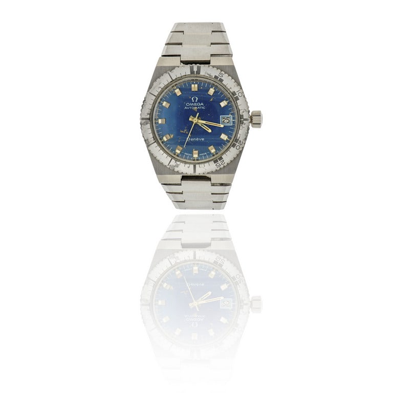 OMEGA - Orologio professionale in acciaio, diver: OMEGA - Orologio professionale in acciaio, diver degli anni '70 della linea "Geneve", si presenta con bracciale a maglie piatte e lunetta grigia, quadrante blu satin, con indici luminescenti a cubo.
