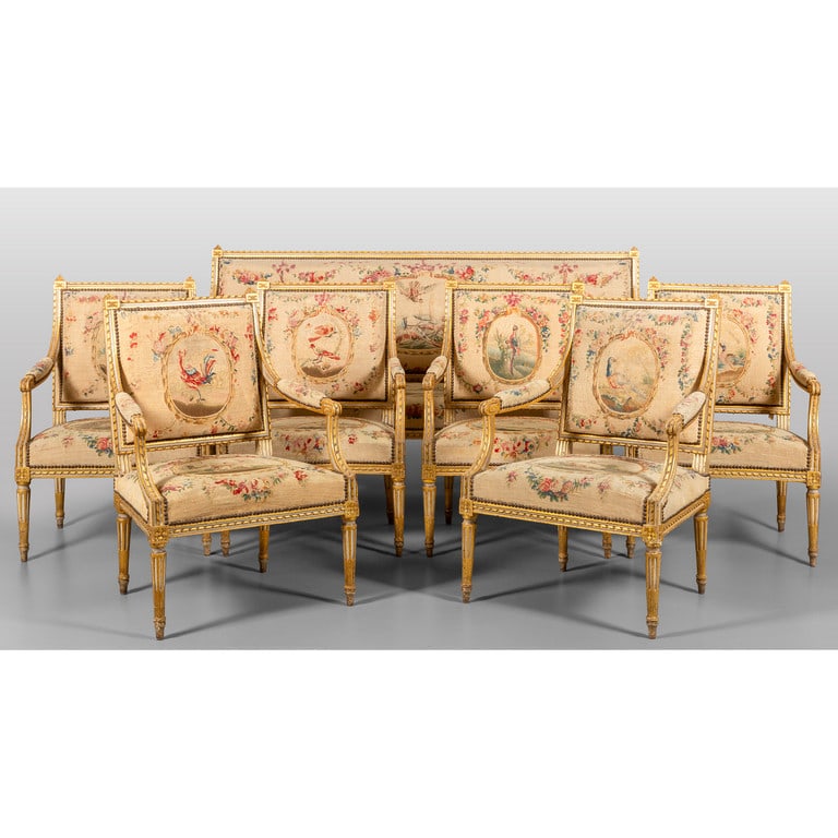 Scuola napoletana sec.XVIII (Sebastiano Conca): Salotto Luigi XVI in legno laccato azzurro e oro composto da divano e sei poltrone, coperture di epoca a ricamo con animali e fiori, Francia II metà sec.XVIII