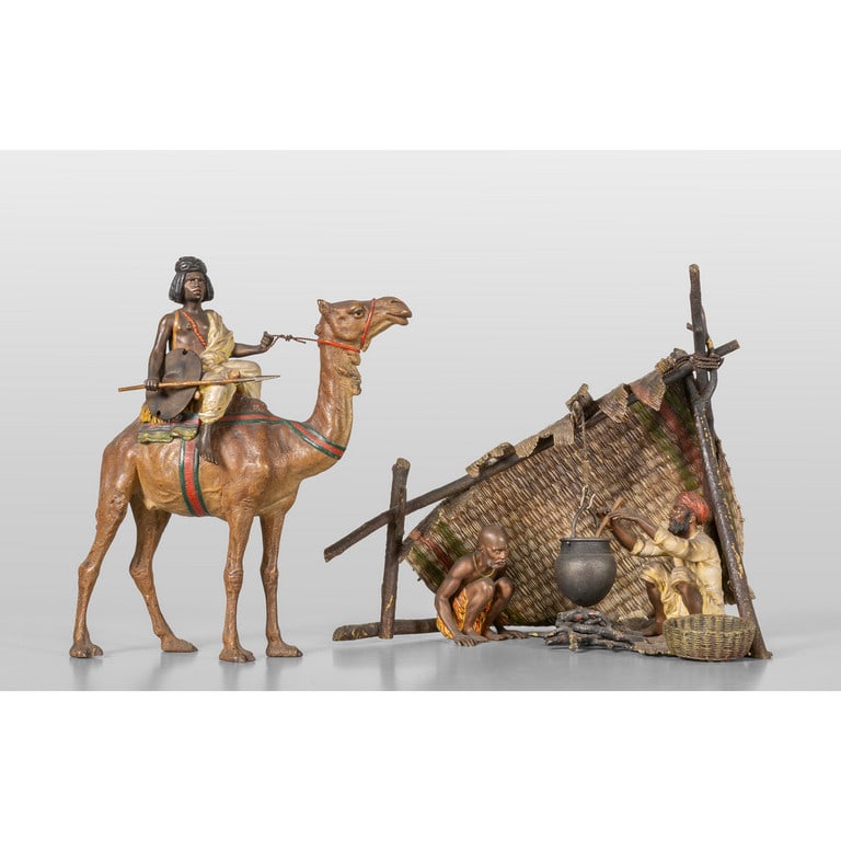 BERGMAN FRANZ (1861-1936) Coppia di guerrieri: BERGMAN FRANZ (1861-1936) Arabo su dromedario e capanna berbera due sculture in bronzo smaltate a freddo h.cm.25 circa