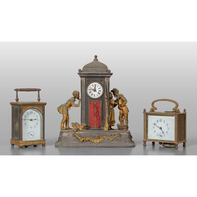 Lotto di due officier e un orologio Luigi Filippo: Lotto di due officier e un orologio Luigi Filippo in bronzo a soggetto militare, sec.XIX h.cm.9,11 e 24
