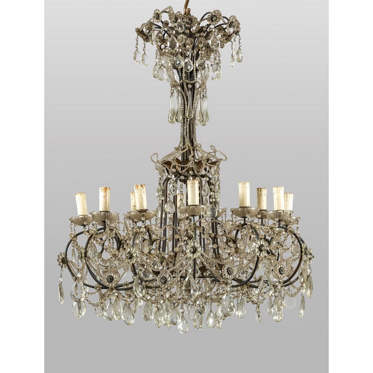 Lampadario a dodici luci in ferro e cristallo,: Lampadario a dodici luci in ferro e cristallo, sec.XIX diam.cm.80xh.120