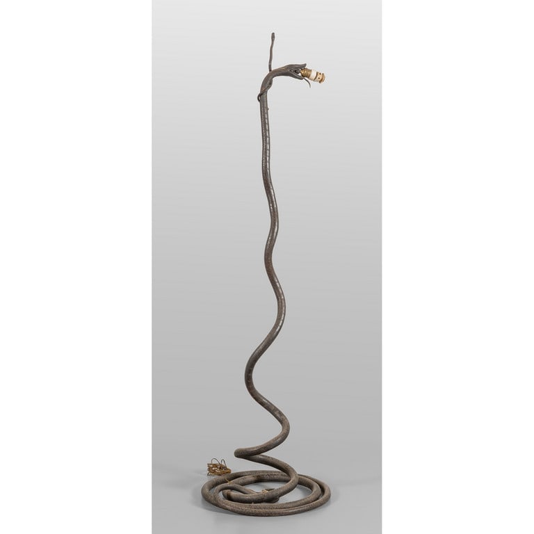 Piantana in ferro a forma di serpente,: Piantana in ferro a forma di serpente, sec.XX h.cm.180