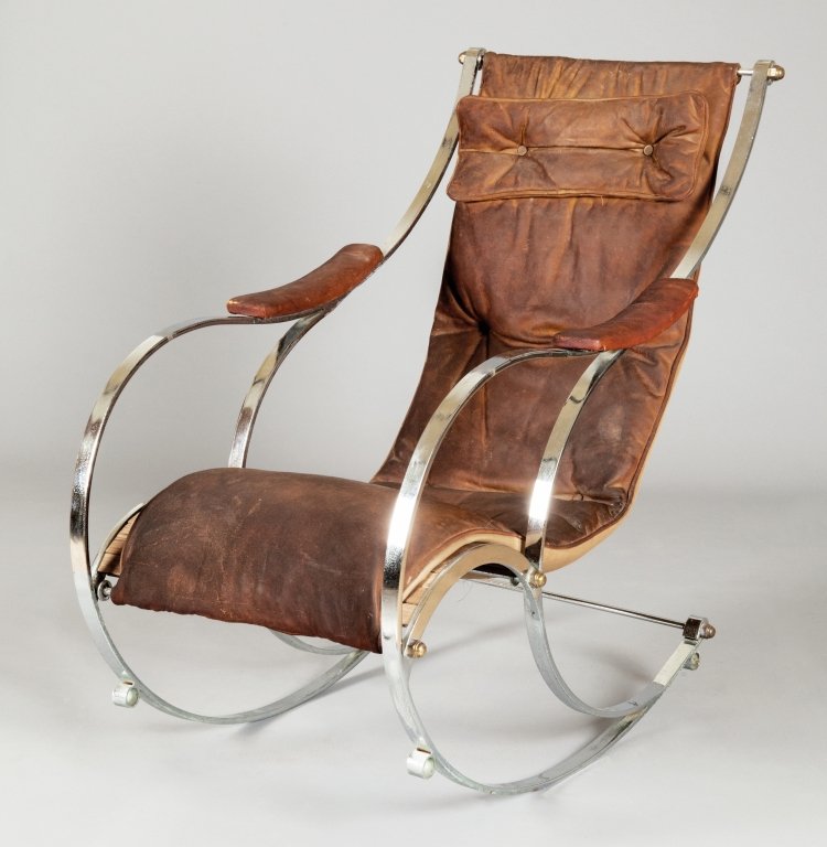 Sedia a dondolo in acciaio e cuoio sec.XX: Sedia a dondolo in acciaio e cuoio sec.XX