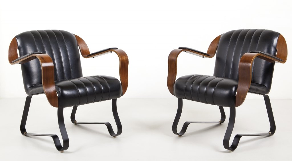 DUE POLTRONCINE, anni '60. Piatto di acciaio: DUE POLTRONCINE, anni '60. Piatto di acciaio piegato e verniciato, compensato curvato, imbottiture rivestite in skai. Altezza cm 76, larghezza 67, profonditÃ 60.