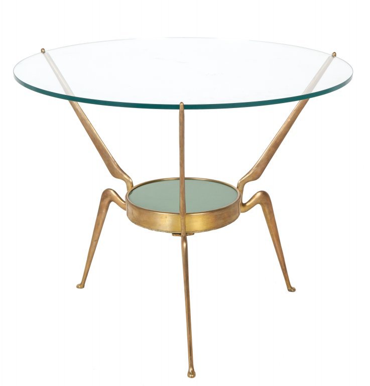 UN TAVOLINO, anni Â’50. Ottone, cristallo.: UN TAVOLINO, anni Â’50. Ottone, cristallo. Altezza cm 48, diametro cm 60.