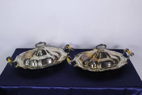 Pair of Silver Plate Casserole Dishes: A very rate matching pair of silver plate covered casserole dishes. 19"L x 12"D