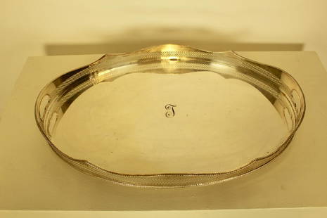 Handled Silver Plate Tray: English handled and footed silver plate tray with pierced outsides, monogramed with a T, 24.5" L x 16" W