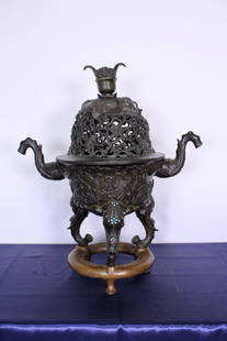 Ming Dynasty Bronze Censer: Ming Dynasty Bronze Censer decorated with elephants and inlaid with hardstone, 18"W x 20"H