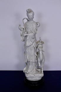 Early 20th Century Blanc de Chine Buddhist Statue: Blanc de Chine Buddhist Statue of Guanyin and Deer executed in exceptional detail, early 20th century 9"W x 7"D x 28"H