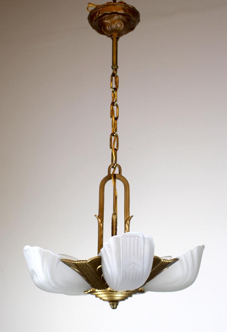 5 Light Art Deco with Leaf Motif: Charming 5 light Art Deco Drop Fixture. Gold painted finish, very contemporary leaf design on central column, with original shades. Rewired, restored and ready to hang. Meas: 33"L x 18"D