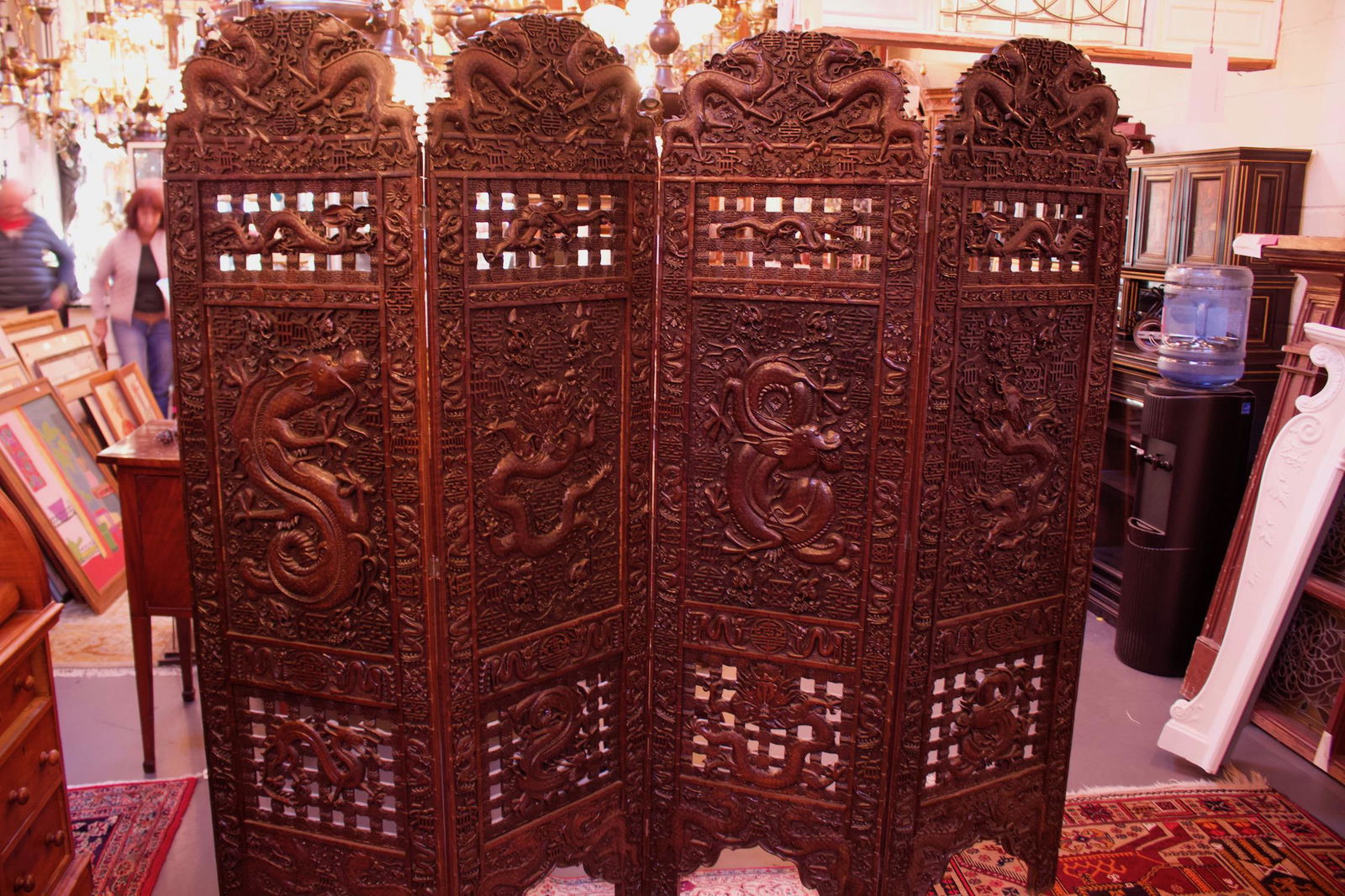 Carved Wooden Chinese Room Divider Screen: Carved Wooden Chinese Room Divider Screen, consisting of 4 panels. Each panel measures 71.75"H x 19.75"W x 1"Thick.