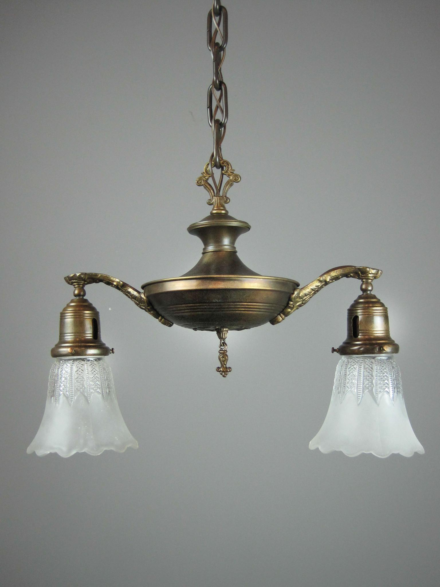Original Pan Light Fixture (2-Light): Ca. 1915 A nicely detailed 2-light pan fixture. Embossed floral body with matched shade holders. Fitted with re-cast etched 1/2 and 1/2 shades. Re-wired and fully restored, ready to hang. 12"H x 17"W 