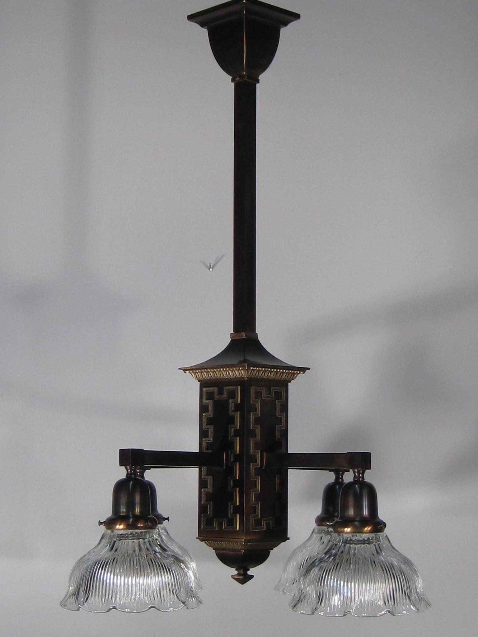 Arts and Crafts Mission Light Fixture: Arts and Crafts Mission Light Fixture. Refinished in a dark brass and fitted with recast fluted edge holophane shades. 33"L x 22.5"W